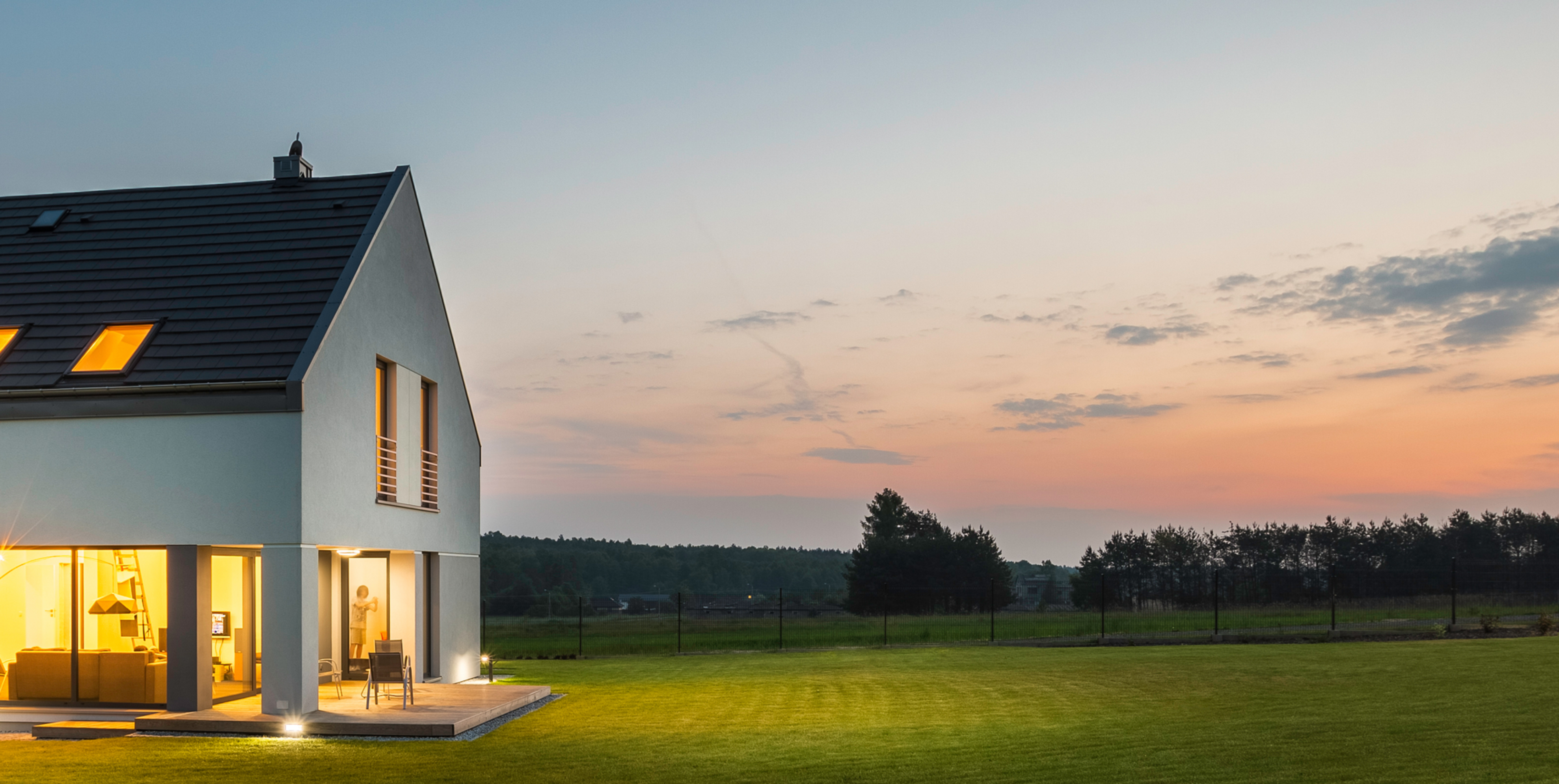 A well-lit home in the evening